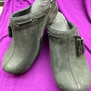 Dansko clogs. Never worn.